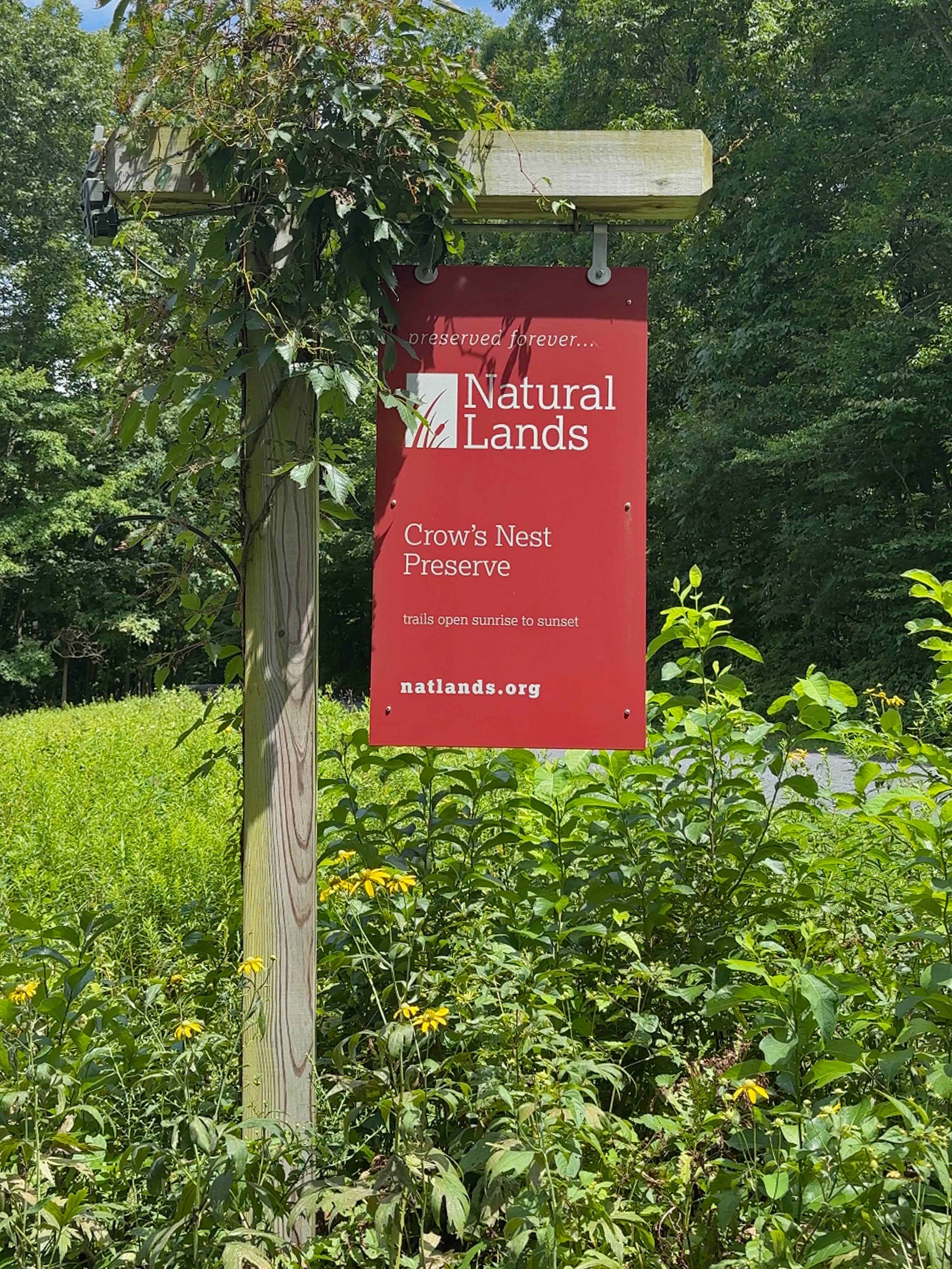 Identification sign for Crow's Nest Preserve.